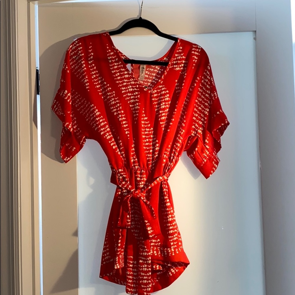 Red romper with tie front belt